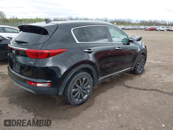 2018 Kia Sportage EX with VIN KNDPN3AC7J7451509, listed as a IAAI auction lot 41925277 with 64,933 mi miles and . Bid and sale history available at DreamBid. Image 4.