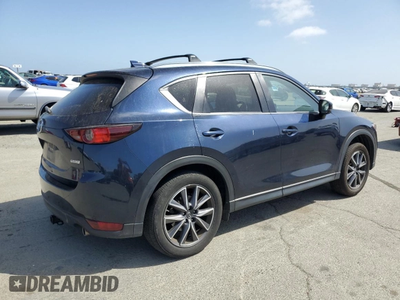2018 Mazda CX-5 Touring with VIN JM3KFACM6J1323449, listed as a Copart auction lot 54090445 with 93,748 mi miles and Salvage Title. Bid and sale history available at carsss.com. Image 3.
