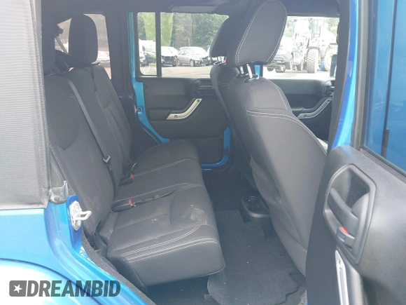 2015 Jeep Wrangler Unlimited Sahara with VIN 1C4BJWEG4FL677879, listed as a IAAI auction lot 42676097 with 85,821 mi miles and . Bid and sale history available at DreamBid. Image 8.
