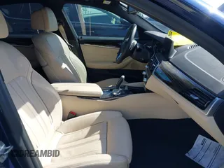 2019 BMW 5 Series 530e iPerformance with VIN WBAJA9C59KB389898, listed as a IAAI auction lot 41479595 with 90,965 mi miles. Bid and sale history available at carsss.com. Image 5.