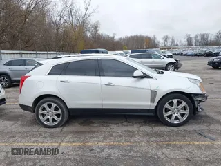 2014 Cadillac SRX Premium Collection z VIN 3GYFNDE34ES548826, wystawiony jako IAAI lot #40792942 z przebiegiem 115 984 mil mil oraz . Historia ofert i sprzedaży dostępna na DreamBid. Obrazek 14.