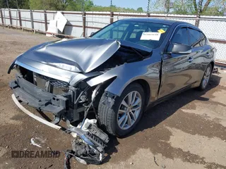 2015 Infiniti Q50 z VIN JN1BV7AP6FM335914, wystawiony jako IAAI lot #42065648 z przebiegiem 192 986 mil mil oraz . Historia ofert i sprzedaży dostępna na DreamBid. Obrazek 2.