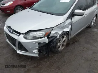 2012 Ford Focus SE z VIN 1FAHP3K27CL152803, wystawiony jako IAAI lot #42058556 z przebiegiem 181 717 mil mil oraz . Historia ofert i sprzedaży dostępna na DreamBid. Obrazek 6.
