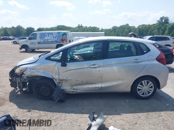 2016 Honda Fit LX z VIN JHMGK5H57GX013219, wystawiony jako IAAI lot #42445275 z przebiegiem 67 686 mil mil oraz . Historia ofert i sprzedaży dostępna na DreamBid. Obrazek 15.