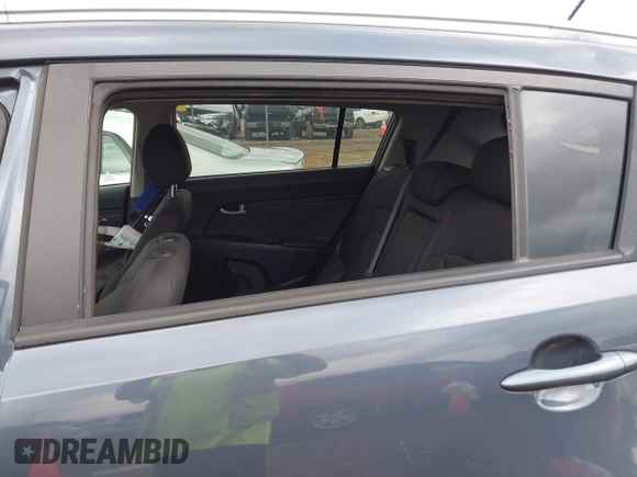 2013 Kia Sportage LX with VIN KNDPB3A26D7452008, listed as a IAAI auction lot 42435597 with 109,397 mi miles and . Bid and sale history available at DreamBid. Image 18.
