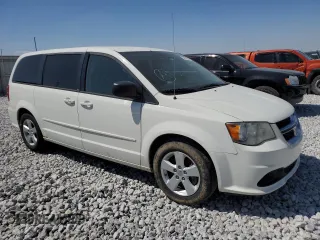 2013 Dodge Grand Caravan SE with VIN 2C4RDGBG9DR772944, listed as a Copart auction lot 56014894 with 193,635 mi miles and Salvage Title. Bid and sale history available at DreamBid. Image 4.