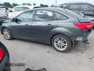 2018 Ford Focus SE with VIN 1FADP3F22JL295342, listed as a IAAI auction lot 42335881 with 77,464 mi miles and . Bid and sale history available at DreamBid. Image 15.