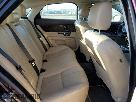 2014 Jaguar XJ with VIN SAJWA1CZ3E8V69877, listed as a Copart auction lot 48159005 with 57,567 mi miles and Clean Title. Bid and sale history available at DreamBid. Image 10.