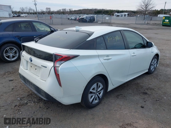 2018 Toyota Prius Two with VIN JTDKARFU1J3547525, listed as a IAAI auction lot 41739561 with 148,300 mi miles. Bid and sale history available at carsss.com. Image 4.