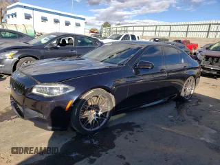 2016 BMW M5 with VIN WBSFV9C57GD595836, listed as a Copart auction lot 38796484 with 48,561 mi miles and Salvage Title. Bid and sale history available at carsss.com. Image 1.