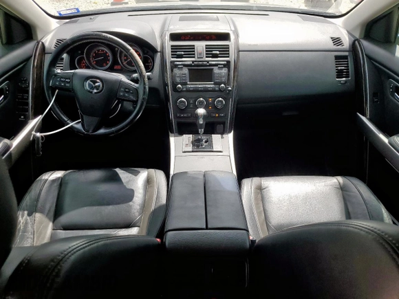 2010 Mazda CX-9 Grand Touring with VIN JM3TB3MA5A0229925, listed as a Copart auction lot 63072725 with 146,483 mi miles and Salvage title. Bid and sale history available at DreamBid. Image 8.