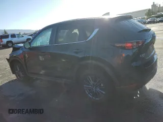 2021 Mazda CX-5 Touring with VIN JM3KFBCM5M1484465, listed as a Copart auction lot 44201845 with 23,777 mi miles and Salvage Title. Bid and sale history available at carsss.com. Image 2.