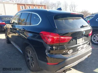 2019 BMW X1 xDrive28i with VIN WBXHT3C50K5L35416, listed as a IAAI auction lot 41195144 with 75,643 mi miles. Bid and sale history available at carsss.com. Image 3.