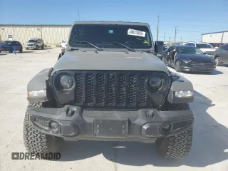 2022 Jeep Gladiator Texas Trail with VIN 1C6HJTAG8NL103449, listed as a Copart auction lot 49823595 with 60,902 mi miles and Salvage Title. Bid and sale history available at carsss.com. Image 5.