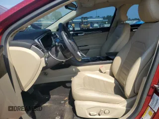 2015 Ford Fusion SE z VIN 3FA6P0H97FR288087, wystawiony jako Copart lot #57446515 z przebiegiem 87 472 mil mil oraz Szkoda całkowita • Salvage title. Historia ofert i sprzedaży dostępna na DreamBid. Obrazek 7.