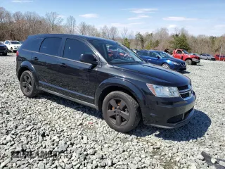 2013 Dodge Journey American Value with VIN 3C4PDCAB9DT583875, listed as a Copart auction lot 50511055 with 163,587 mi miles and Salvage Title. Bid and sale history available at DreamBid. Image 4.