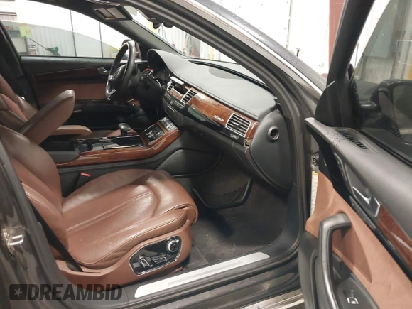 2011 Audi A8 with VIN WAURVAFD1BN016929, listed as a IAAI auction lot 42144918 with 171,874 mi miles and . Bid and sale history available at DreamBid. Image 5.