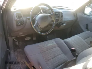 2002 Ford F-150 XL with VIN 1FTRF18232NA58109, listed as a Copart auction lot 88929065 with 148,228 mi miles and Salvage title. Bid and sale history available at DreamBid. Image 8.