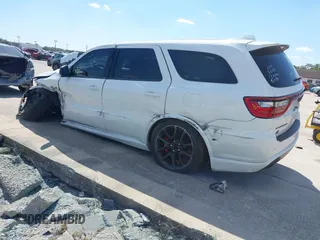 2021 Dodge Durango SRT 392 with VIN 1C4SDJGJ8MC724105, listed as a IAAI auction lot 41883925 with 31,184 mi miles and . Bid and sale history available at carsss.com. Image 3.
