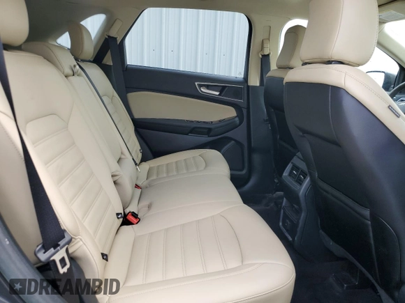 2020 Ford Edge SEL с VIN 2FMPK4J95LBB17293, выставлен на аукционе Copart как лот 58796255 с пробегом 82 583 миль миль и Чистый • Clean title. История ставок и продаж доступна на DreamBid. Изображение 11.