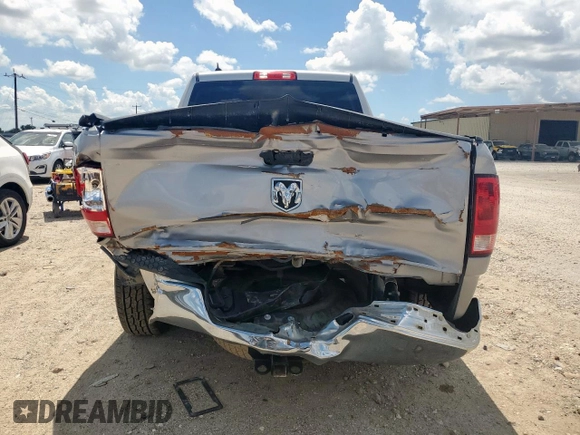 2021 Ram 1500 Tradesman with VIN 1C6RR6FGXMS575924, listed as a Copart auction lot 62588665 with 112,239 mi miles and Salvage title. Bid and sale history available at DreamBid. Image 6.