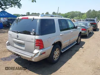 2004 Mercury Mountaineer with VIN 4M2DU86E34ZJ53426, listed as a IAAI auction lot 42410215 with 150,471 mi miles and . Bid and sale history available at DreamBid. Image 4.