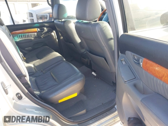 2003 Lexus GX 470 with VIN JTJBT20XX30015034, listed as a IAAI auction lot 41386690 with 234,983 mi miles. Bid and sale history available at carsss.com. Image 8.