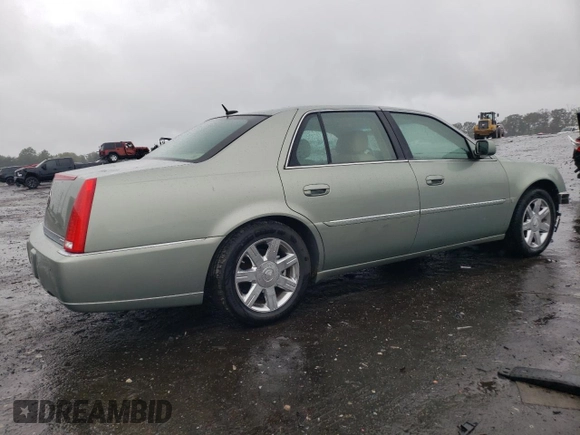 2006 Cadillac DTS 1SC z VIN 1G6KD57Y26U182388, wystawiony jako Copart lot #71929184 z przebiegiem 91 711 mil mil oraz Szkoda całkowita • Salvage title. Historia ofert i sprzedaży dostępna na DreamBid. Obrazek 3.