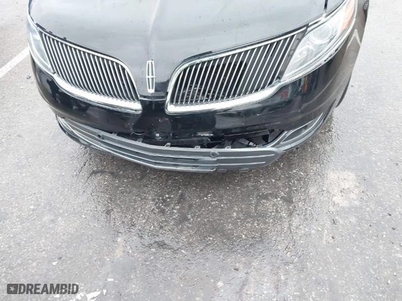 2016 Lincoln MKS EcoBoost with VIN 1LNHL9FT9GG600075, listed as a IAAI auction lot 41214769 with 60100 miles. Bid and sale history available at carsss.com. Image 6.