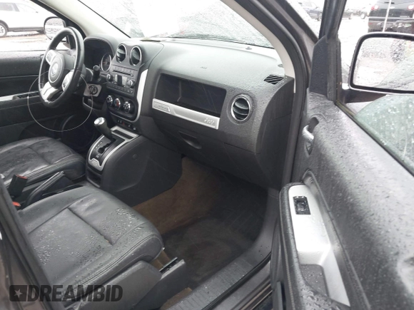 2016 Jeep Compass Latitude with VIN 1C4NJCEA2GD804809, listed as a IAAI auction lot 42329508 with 61,264 mi miles and . Bid and sale history available at DreamBid. Image 5.