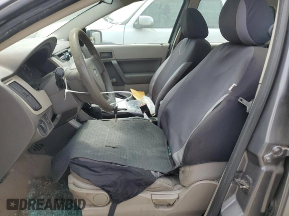 2009 Ford Focus S with VIN 1FAHP34N99W257714, listed as a Copart auction lot 52609535 with 158,887 mi miles and Salvage Title. Bid and sale history available at carsss.com. Image 7.