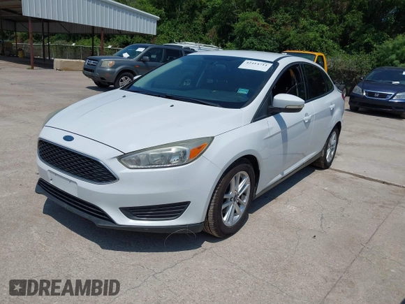 2017 Ford Focus SE with VIN 1FADP3F28HL307889, listed as a IAAI auction lot 42414711 with 169,579 mi miles and . Bid and sale history available at DreamBid. Image 2.