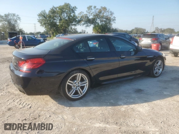 2015 BMW 6 Series 650i xDrive with VIN WBA6B4C55FD761530, listed as a Copart auction lot 75430464 with 18,729 mi miles and Salvage Title. Bid and sale history available at DreamBid. Image 3.