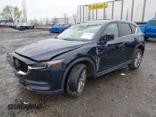 2019 Mazda CX-5 Grand Touring with VIN JM3KFBDM6K0592496, listed as a IAAI auction lot 41730103 with Not Provided miles and . Bid and sale history available at carsss.com. Image 2.