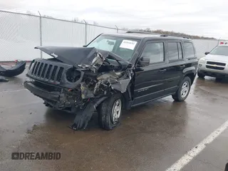 2014 Jeep Patriot Sport with VIN 1C4NJRBBXED879285, listed as a IAAI auction lot 41944152 with 103,676 mi miles. Bid and sale history available at carsss.com. Image 2.