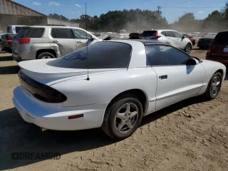 1997 Pontiac Firebird Trans Am z VIN 2G2FV22P5V2209729, wystawiony jako Copart lot #78074474 z przebiegiem 84 727 mil mil oraz Czysty tytuł • Clean title. Historia ofert i sprzedaży dostępna na DreamBid. Obrazek 3.