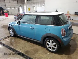 2009 MINI Hardtop with VIN WMWMF33569TW74610, listed as a Copart auction lot 54889805 with 147,533 mi miles and Salvage Title. Bid and sale history available at DreamBid. Image 2.