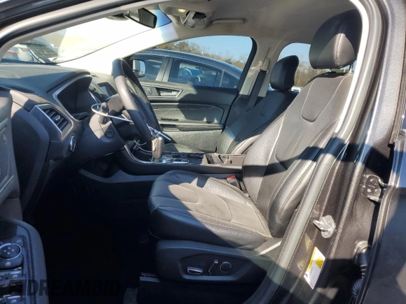 2019 Ford Edge Titanium z VIN 2FMPK3K96KBC31844, wystawiony jako Copart lot #85897344 z przebiegiem 59 421 mil mil oraz Szkoda całkowita • Salvage title. Historia ofert i sprzedaży dostępna na DreamBid. Obrazek 7.