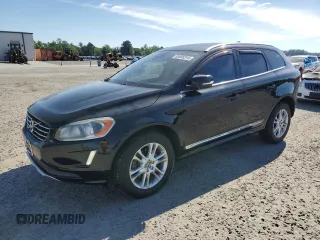 2015 Volvo XC60 T5 z VIN YV4612RKXF2630397, wystawiony jako Copart lot #55935315 z przebiegiem 158 277 mil mil oraz Czysty tytuł • Clean title. Historia ofert i sprzedaży dostępna na DreamBid. Obrazek 1.