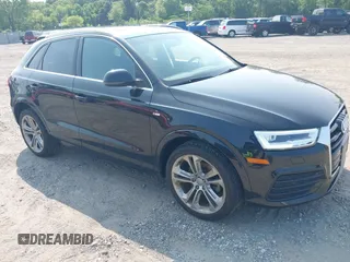 2017 Audi Q3 Prestige z VIN WA1GCCFS0HR015809, wystawiony jako IAAI lot #42405089 z przebiegiem 111 565 mil mil oraz . Historia ofert i sprzedaży dostępna na DreamBid. Obrazek 1.