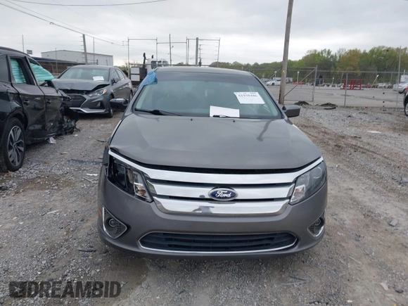 2010 Ford Fusion Hybrid z VIN 3FADP0L31AR326917, wystawiony jako IAAI lot #41938486 z przebiegiem 132 845 mil mil oraz . Historia ofert i sprzedaży dostępna na DreamBid. Obrazek 12.