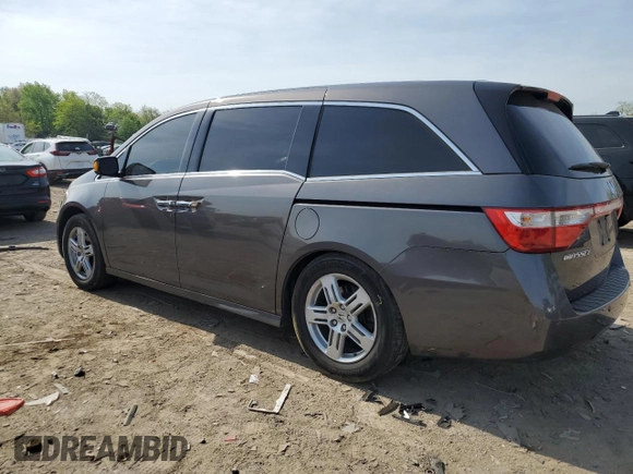 2012 Honda Odyssey Touring with VIN 5FNRL5H92CB134917, listed as a Copart auction lot 54437875 with 139,318 mi miles and Salvage Title. Bid and sale history available at DreamBid. Image 2.