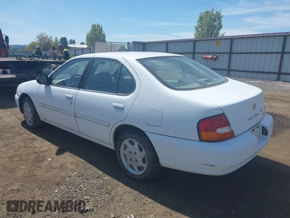 1999 Nissan Altima XE with VIN 1N4DL01D9XC104530, listed as a IAAI auction lot 42141246 with 168,803 mi miles. Bid and sale history available at carsss.com. Image 3.