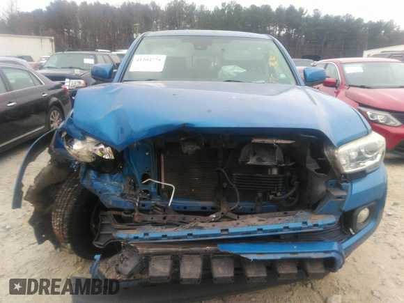 2018 Toyota Tacoma SR5 with VIN 3TMAZ5CN3JM066409, listed as a IAAI auction lot 41204775 with 75,000 mi miles and . Bid and sale history available at DreamBid. Image 12.
