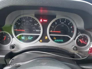 2010 Jeep Wrangler Unlimited Sport with VIN 1J4BA3H11AL144560, listed as a IAAI auction lot 42013032 with 226,233 mi miles. Bid and sale history available at carsss.com. Image 7.