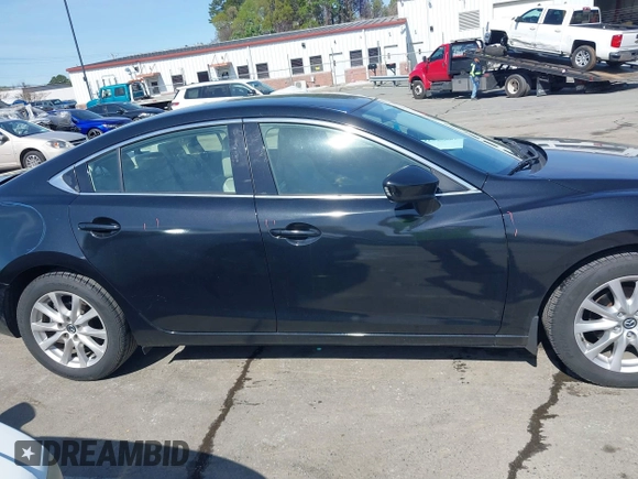 2016 Mazda Mazda6 i Sport with VIN JM1GJ1U54G1422560, listed as a IAAI auction lot 41935881 with 87,030 mi miles. Bid and sale history available at carsss.com. Image 14.