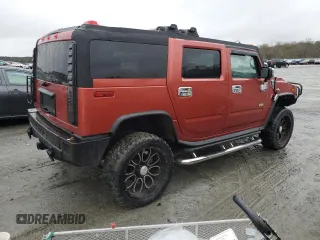 2003 Hummer H2 with VIN 5GRGN23U33H136931, listed as a Copart auction lot 80671794 with 127,137 mi miles and Salvage Title. Bid and sale history available at carsss.com. Image 3.