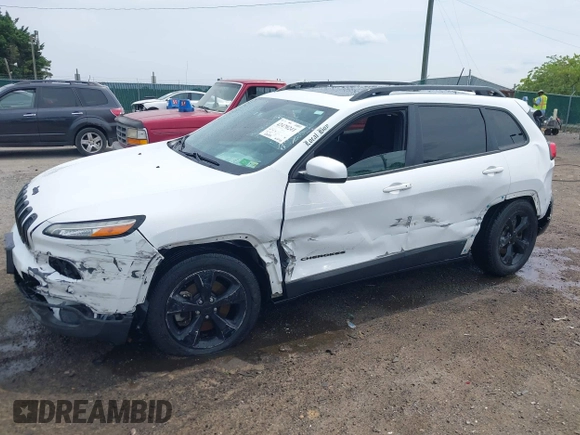 2016 Jeep Cherokee Altitude with VIN 1C4PJMCB3GW121211, listed as a IAAI auction lot 42470241 with 168,343 mi miles and . Bid and sale history available at DreamBid. Image 6.