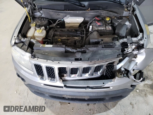 2016 Jeep Compass Sport with VIN 1C4NJCBA1GD512864, listed as a Copart auction lot 56297115 with 216,693 mi miles and Salvage title. Bid and sale history available at DreamBid. Image 12.