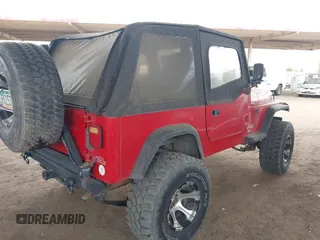1994 Jeep Wrangler with VIN 1J4FY29S1RP437913, listed as a IAAI auction lot 42185965 with 245,618 mi miles and . Bid and sale history available at DreamBid. Image 4.